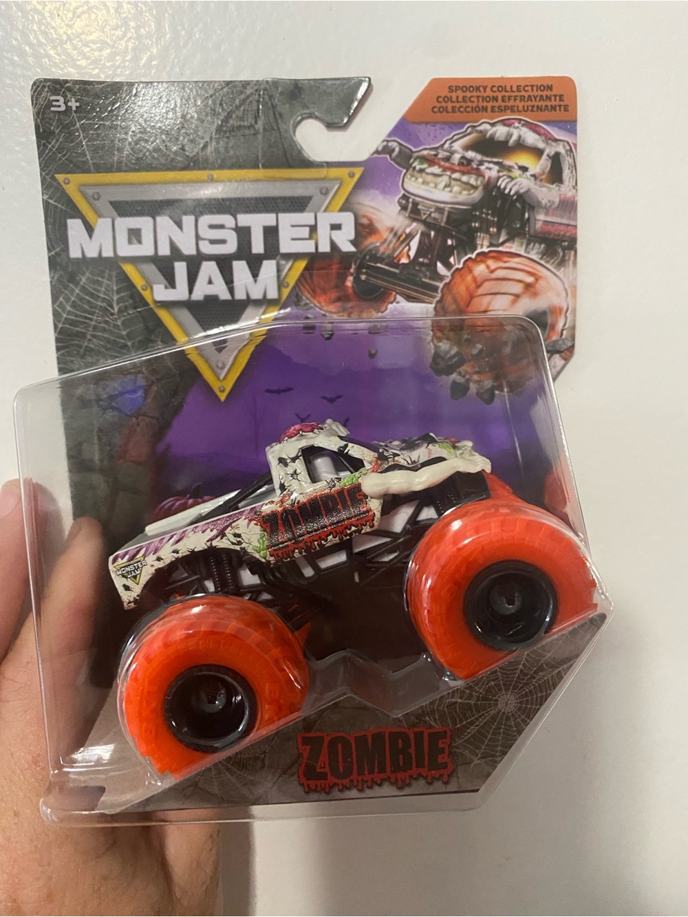 Monster Jam Zombie Monster Truck Toy - White Body with Orange Wheels
